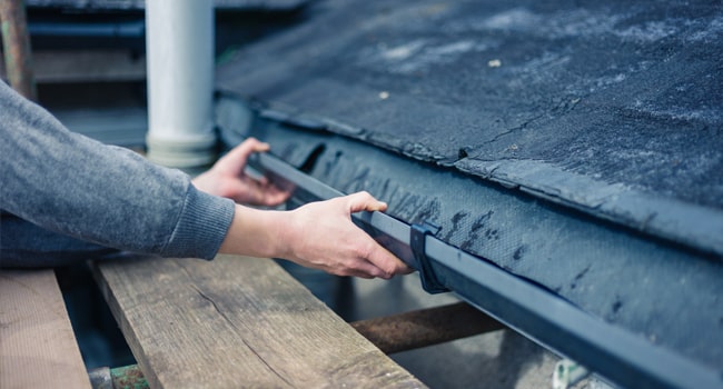 Roof and Gutter Inspection. Shows a roof with gutters.